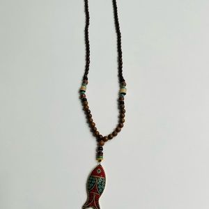 Brown beads with brown and teal fish